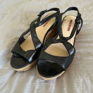 Prada Wedge leather sandals. 8
